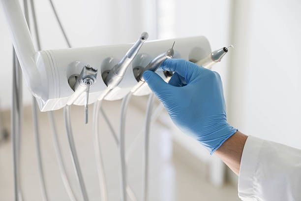 Professional Root Canal Treatment technician working in Toppers, OK